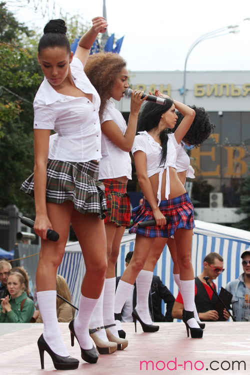 "Jamaica" Girl band (looks: white knee-highs, black pumps, , checkered mini skirt; persons: Erzhena Sanzhiyeva, Marta Zhdanyuk, Tatsiana Boruk)